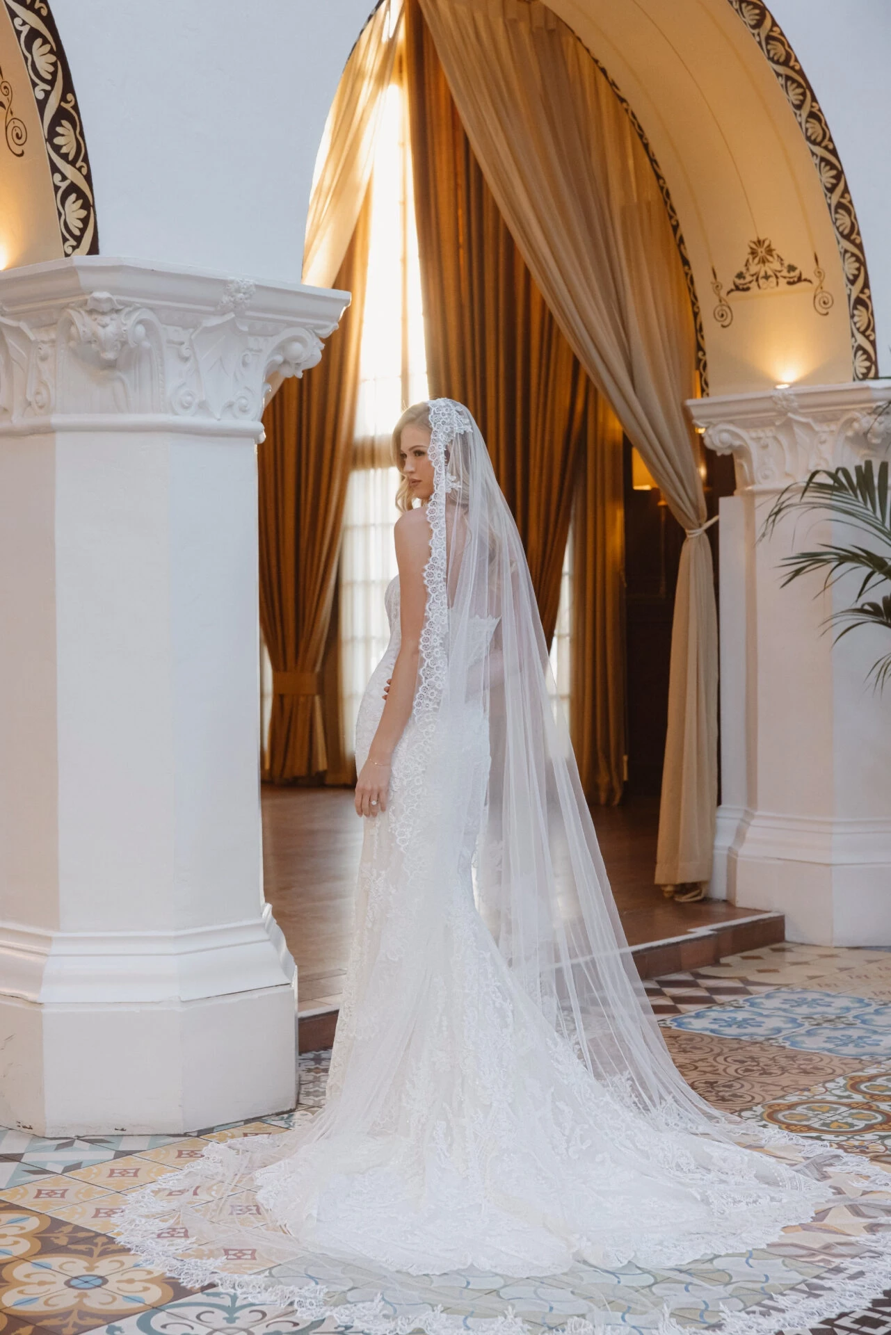 Model wearing style #D4541 Essense of Australia wedding dress