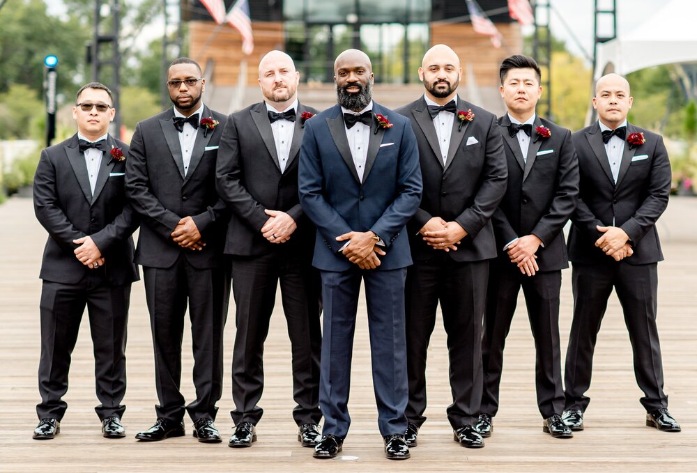 Tierra + Osi  together groom.jpg