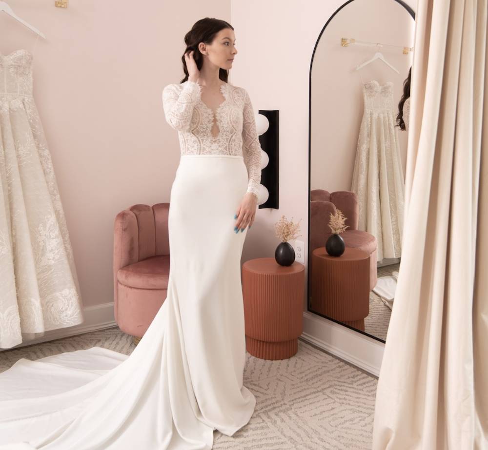 Photo of the model wearing a white gown
