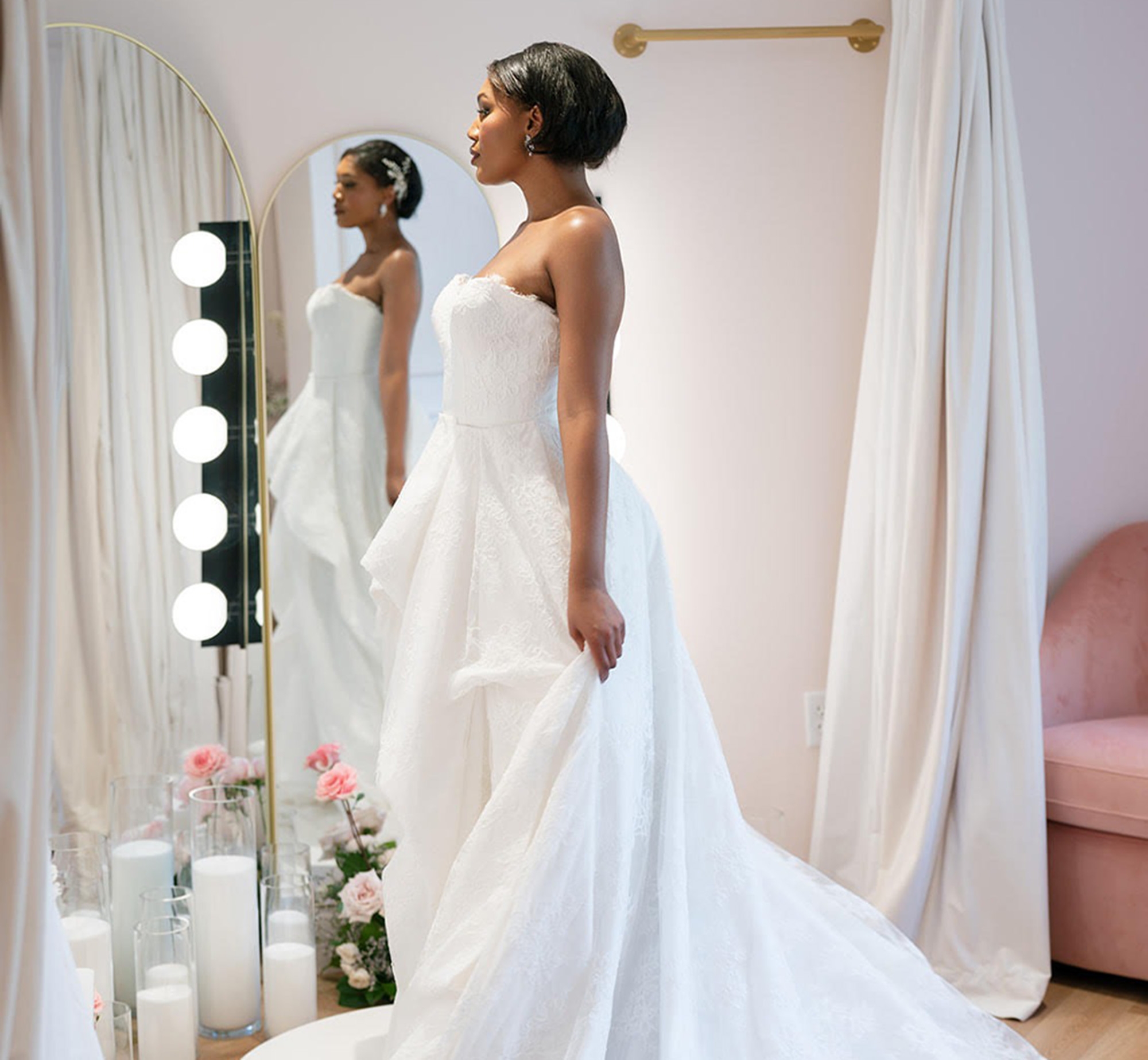 Photo of the model wearing a white gown