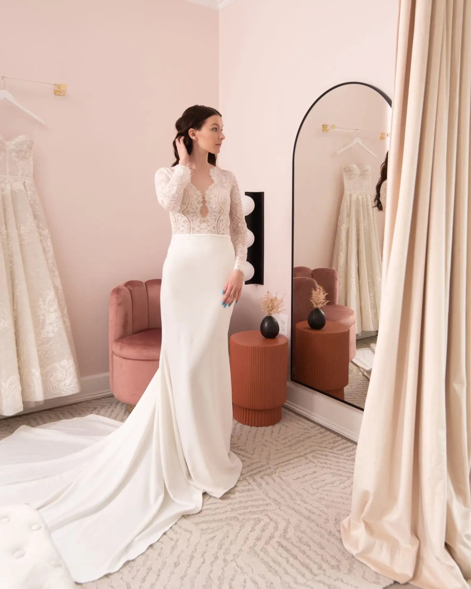 Model wearing a white gown