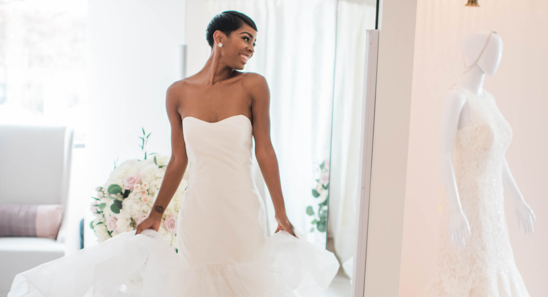 Model wearing a white gown