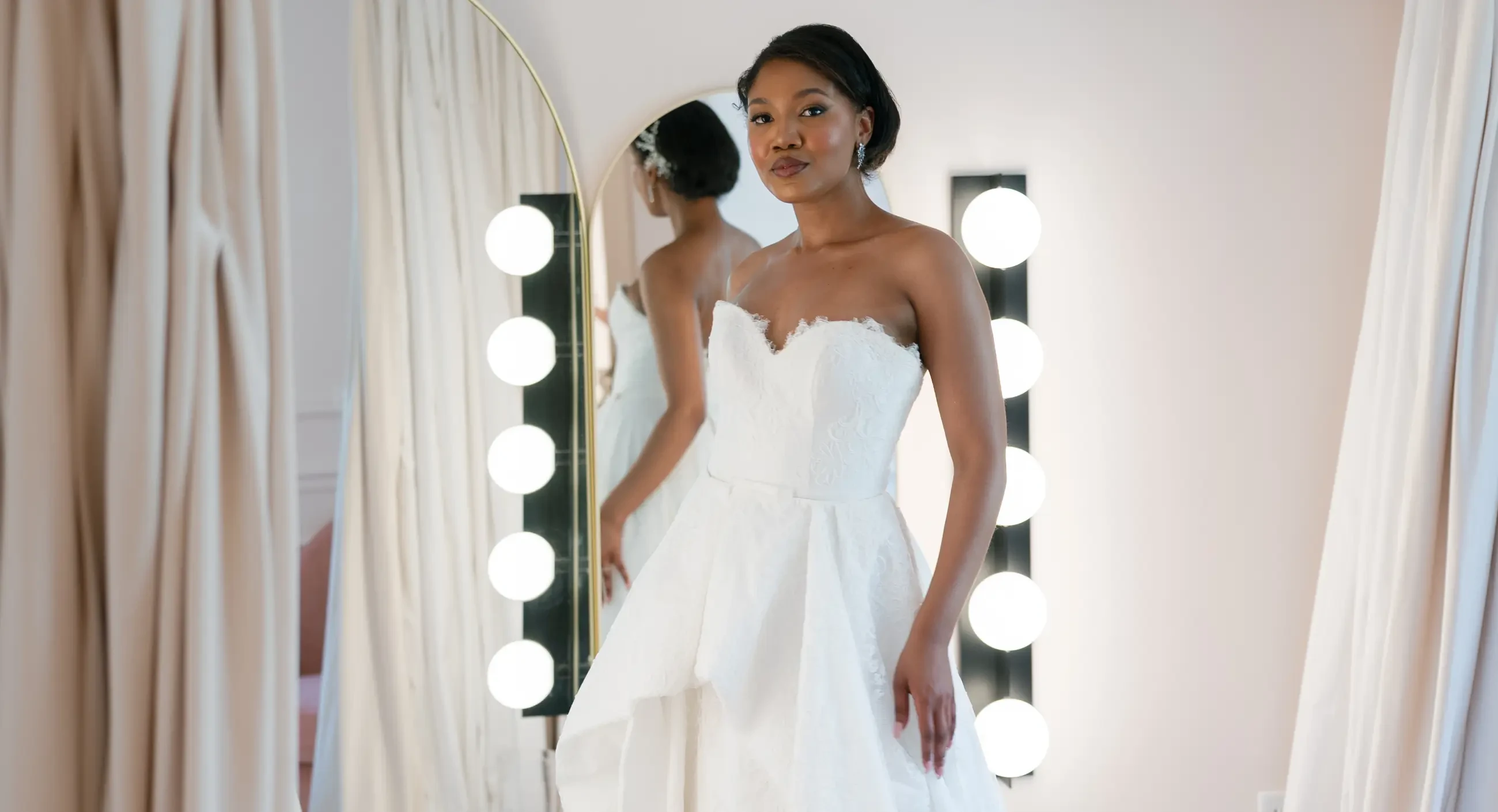 Model wearing a white gown